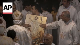 Egypts Coptic Christians flock to churches to mark beginning of their Easter [upl. by Oinesra]