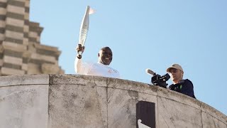 JO Paris 2024  Basile Boli lance le relais de la flamme olympique [upl. by Noreh356]