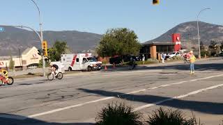 ironmancanada Penticton BC Aug 25 2024 Cyclists heading South on Main St at Duncan Ave [upl. by Oribelle703]