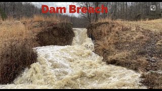 Large pond dam breach causes water surge down stream [upl. by Wojcik]