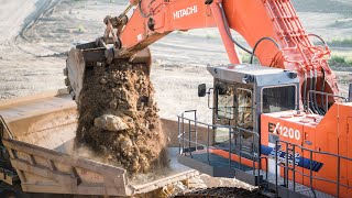 Hitachi 1200 Excavator Loading Caterpillar 777 Trucks in 4K [upl. by Tani148]