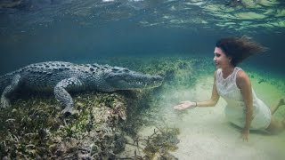 Snap Shot Model Poses Underwater Inches From Deadly Crocodiles [upl. by Biamonte]