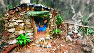 Surviving alone in the jungle Stone shelter BUSHCRAFT Camping in the rain [upl. by Stormi]