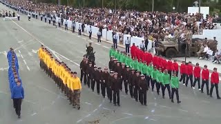 Frances Bastille Day parade meets the Olympic torch relay in an exceptional year [upl. by Nyliak]