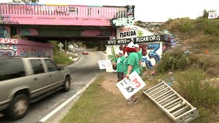 Amendment 3 supporters paint Pensacolas Graffiti Bridge [upl. by Constant255]