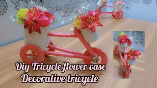 Diy Tricycle flower vaseDecorative tricycle Tricycle flower vase by using cardboard thread amp rope [upl. by Amsirp546]