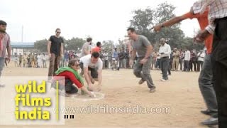 Indian traditional game pitthu or Seven stone played at Pushkar fair Rajasthan [upl. by Proudman]