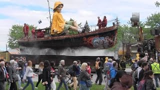 Giant puppets parade through Montreal [upl. by Annaujat5]