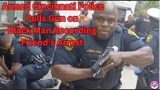 ARMED CINCINNATI POLICE PULLS GUN OF BLACK MAN RECORDING HIS FRIENDS ARREST standwhileblack [upl. by Dahaf]