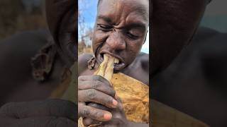 Wow what a delicious breakfast See how Hadza cooks their favorite food middle of nowherevillagelife [upl. by Retep965]