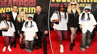 Madonna’s twin daughters make rare red carpet appearance at ‘Deadpool amp Wolverine’ premiere [upl. by Yrffoeg818]