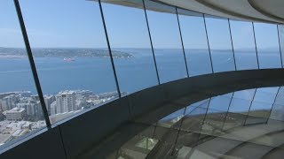 Seattles Space Needle Opens Revolving Glass Floor 500 Feet in the Air [upl. by Lysander302]