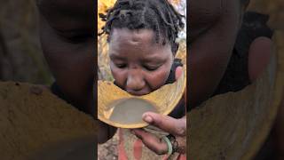 Hadzabe man sharing a food with his Lovely wife 💕😋🍲hadzabetribe villagelife food [upl. by Linker]