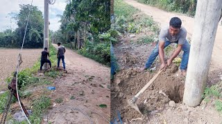 Installation of tensioning wire on electric poles [upl. by Robbyn5]