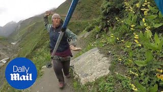 Angry Nepalese woman chases British family on Annapurna Circuit  Daily Mail [upl. by Adnilema]