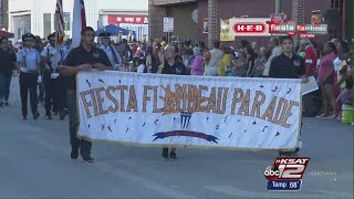 VIDEO Estimated 700000 pack downtown for Fiesta Flambeau Parade [upl. by Airliah]