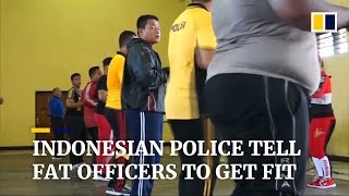 Indonesian police are telling obese officers to get fit [upl. by Aynatan]