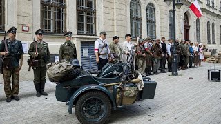 Video Anniversary reconstruction of WW2 Warsaw uprising in Budapest [upl. by Enidlarej]