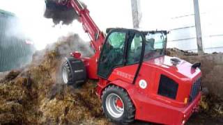 Schaeffer 9330T pivot steer telescopic loader with a bucket and grab [upl. by Ellehsor]