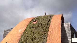 Hawkes Architectures Crossway Passive house How to mow an arched roof [upl. by Dorweiler]