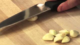 Cooking School How To Mince Garlic Fast [upl. by Aerdnua]