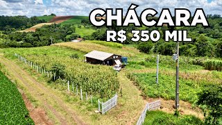 CHÁCARA A VENDA RICA DE ÁGUA CERCADA PLANTAS LAVOURA E GALPÃO R350MIL [upl. by Lacym794]