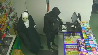 Thieves dressed in costumes rob convenience store at knifepoint in Ont [upl. by Atinra]