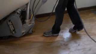 how to sand paint off an old floor with a drum sander [upl. by Anyahc854]