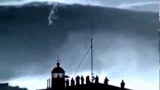 Carlos Burle surfing huge wave November 24 2013 Nazare Portugal [upl. by Eatnoj]