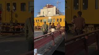 Yellow train cross railroad in Japan youtubeshorts train [upl. by Onaled]