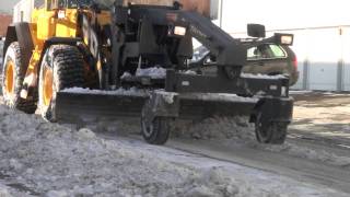 Snow removal in Oslo Norway  with Volvo L60E using a Flexigrader plow [upl. by Ytsrik]