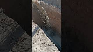 Pouring concrete mixture over sewer pipe [upl. by Thamora]