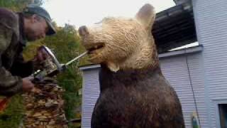 Barre Pinske carves teeth in a wooden bear [upl. by Thant]