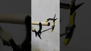 Unique balancing technique with 2 pliers on a wooden stick shorts [upl. by Sylram]