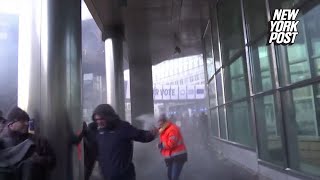 Farmers protesting outside European Parliament in Brussels are hosed by police [upl. by Granoff]