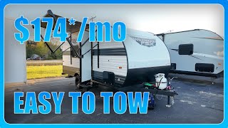 SMALL and AFFORDABLE Travel Trailer  2024 Wildwood 164RBLE [upl. by Lekcar739]