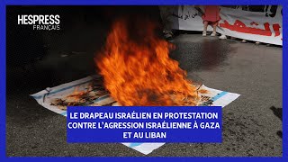 Le drapeau israélien en protestation contre lagression israélienne à Gaza et au Liban [upl. by King]