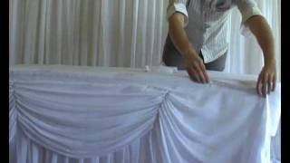 Attaching Box Pleated Wedding Table Skirting Using Skirting Clips [upl. by Daraj943]