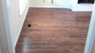 Laminate flooring flowing between rooms without a Tmolding [upl. by Tristas]