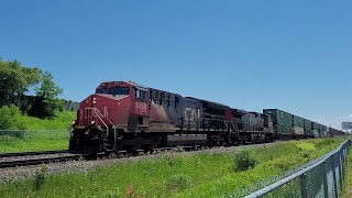 Train MeetDetour CN Q122 CN 3053 CN 2606  VIA 73 VIA 918 at Tansley [upl. by Ahsertal303]