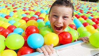 Ali filled swimming pool with colored balls Fun Kids video [upl. by Dorehs]