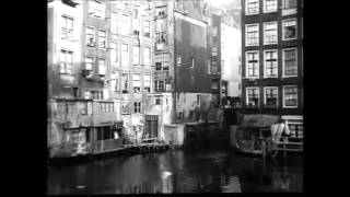 1920 Schilderachtig Oud Amsterdam met oa Oudezijds Achterburgwal en Zeedijk  oude filmbeelden [upl. by Theron]