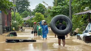 Myanmar residents flee severe floods shelter in a school  AFP [upl. by Nemsaj]