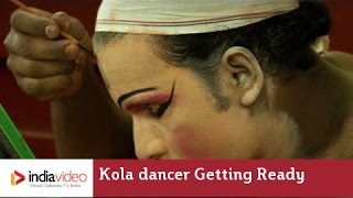 Kola dancer getting ready for Bhuta Kola in Kerala  India Video [upl. by Mercado]