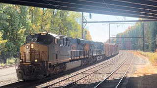 CSX train M410 running in fall colors with a nice Union Pacific wheel set car csxtrains csx [upl. by Soisanahta]