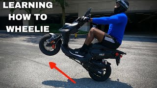 LEARNING HOW TO WHEELIE A SCOOTER  50cc SCOOTER WHEELIES [upl. by Cedar327]