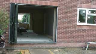 Bifolding doors with integral blinds from Solarfold Bifolding doors [upl. by Zelig]