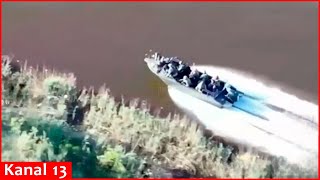 Russians trying to go ashore by boat on Dnipro River are targeted by a Ukrainian drone [upl. by Eimrots]