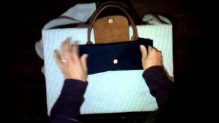 How to fold Longchamp le pliage bag [upl. by Amelus]