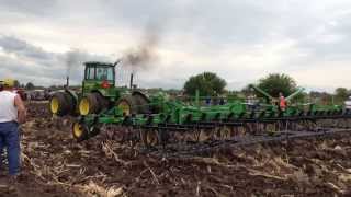 Three John Deere 830s pulling a 45 foot field cultivator [upl. by Enirod]